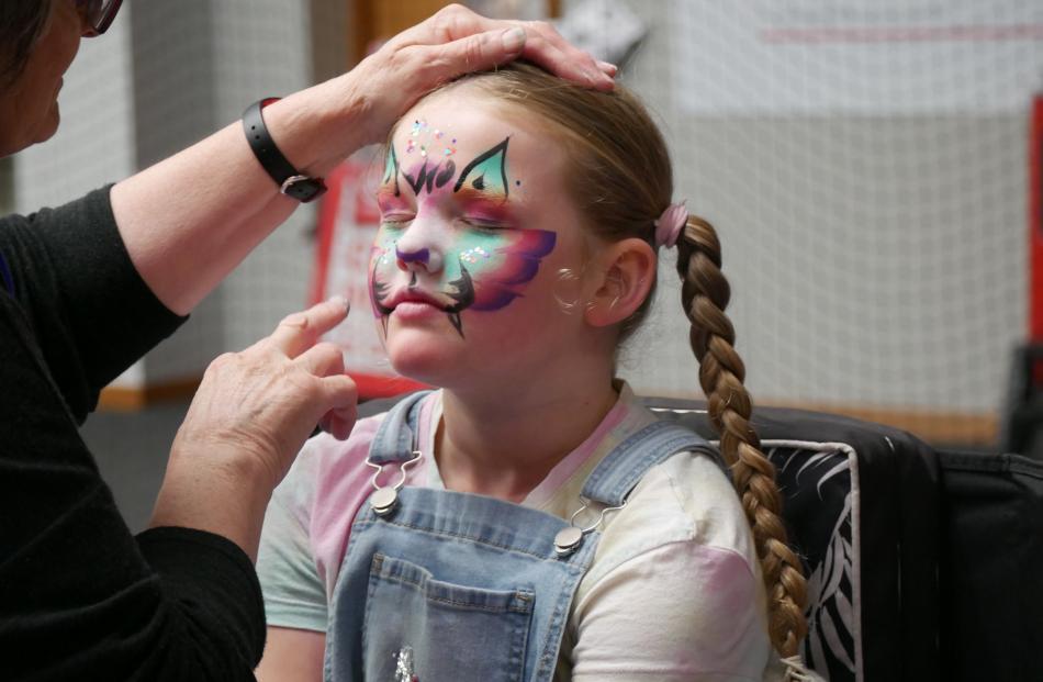 Emily Walton (7), of Abbotsford, has her face painted.

