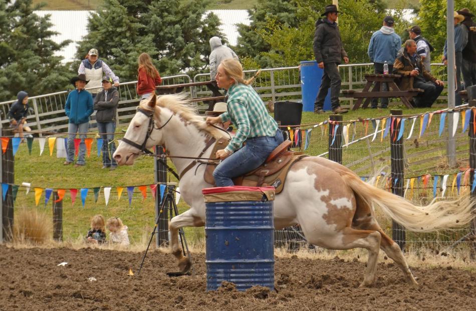 Megan Staples, of Alexandra, competes in the second division barrel race at the Millers Flat...