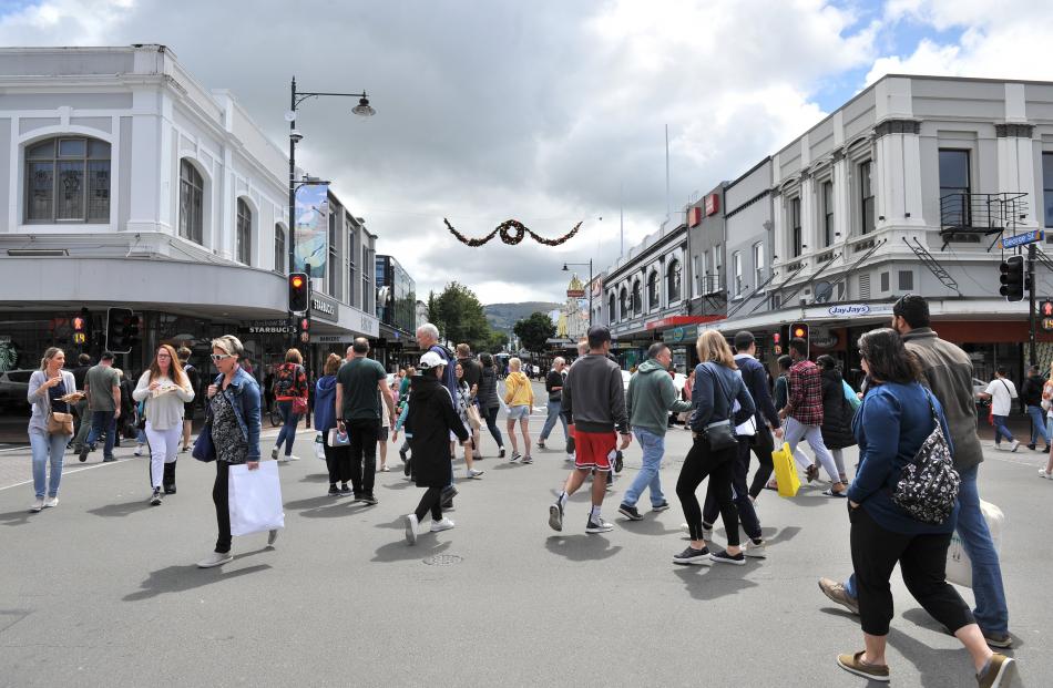 Central Dunedin was bustling with people and traffic was bumper to bumper as crowds went to town...