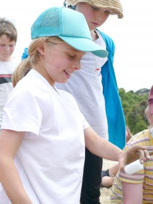 Ella shows her delight after the magic stick works yet again. PHOTOS: RICHARD DAVISON