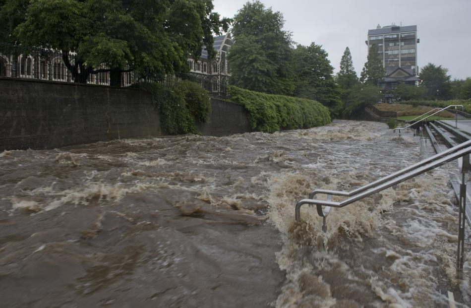 The Water of Leith surges through the University of Otago campus on Saturday. PHOTO: GERARD O...
