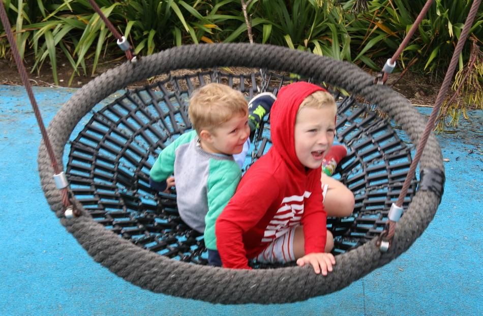 Jonty (2) and Louis (5) Alexander enjoy the playground at Moeraki on January 8. PHOTO: LESLEY...