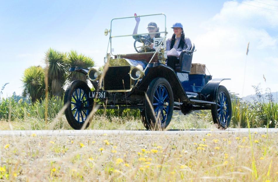 Simon and Im Henderson enjoy the sunshine in their 1912 Ford Model T on Saturday.

