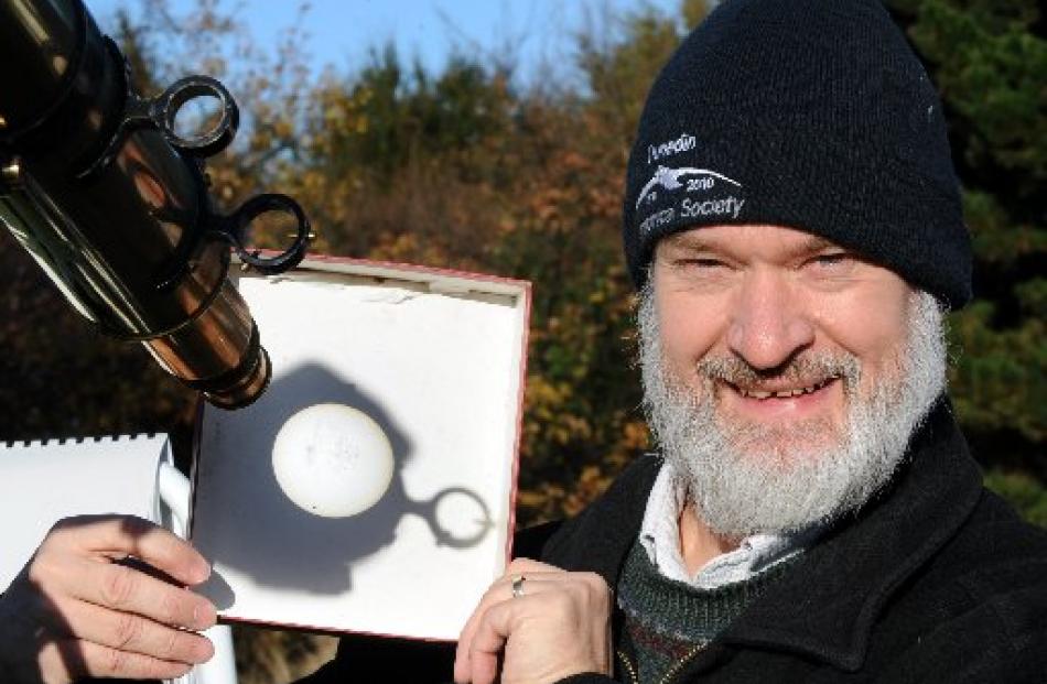 Dunedin Astronomical Society president Peter Jaquiery projects an image of the Sun from a more...