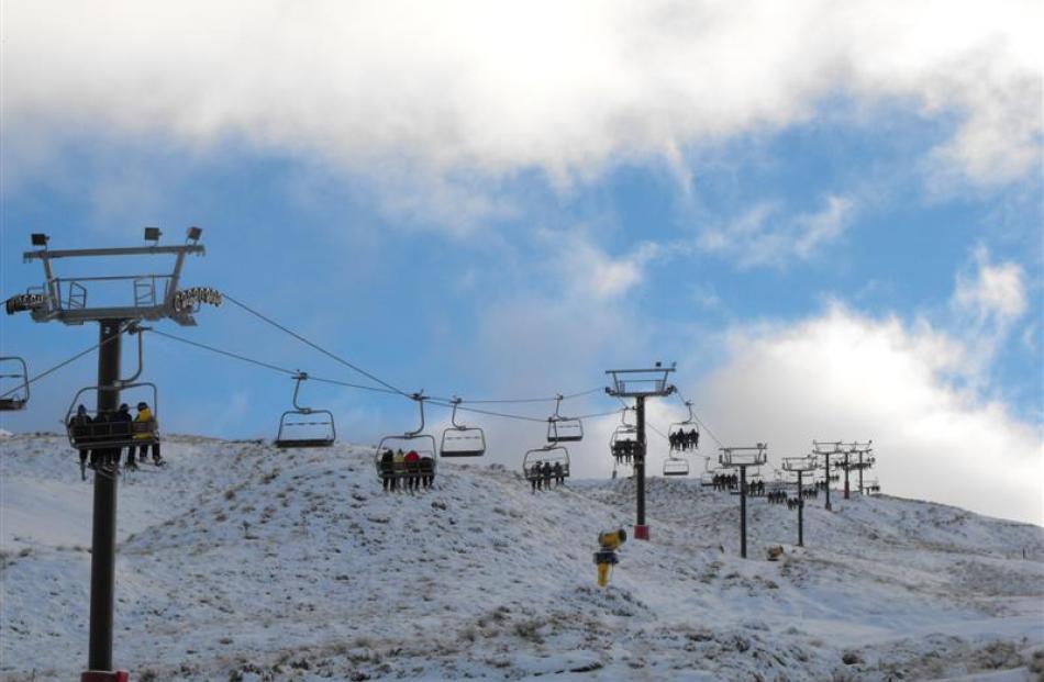 The chairlifts at Coronet Peak were chock-a-block shortly after 9am on Saturday.