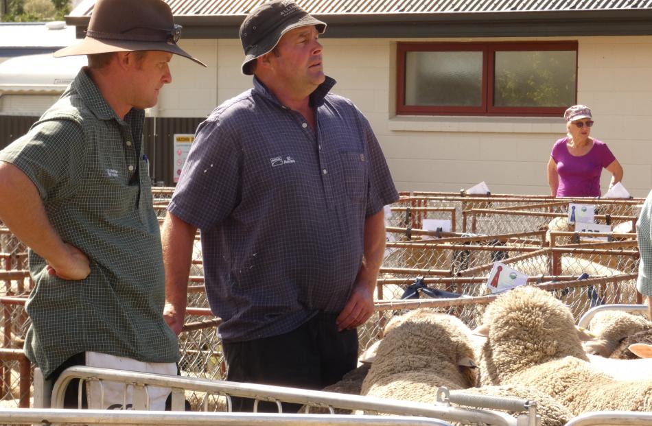 Lochie Rutherford (left), of Poolburn, and Andrew Paterson, of Matakanui Station, wait to find...