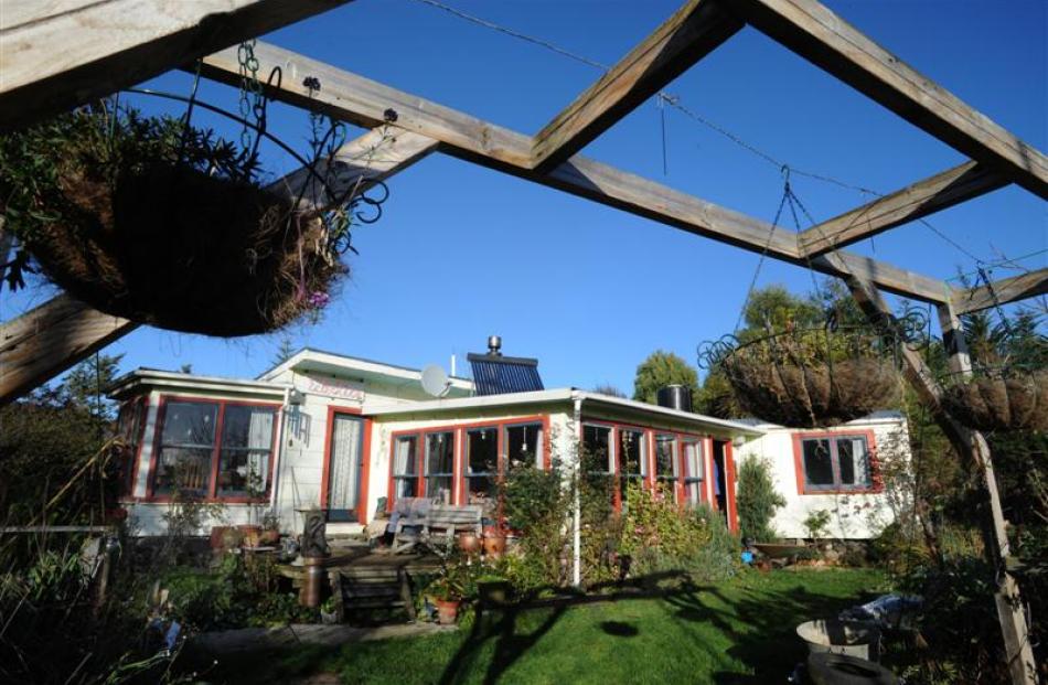 The house consists of a former site office (left), wash house (middle section) and farm workers'...