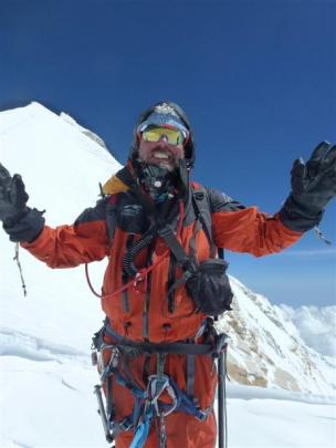 Guy Cotter celebrates his team reaching their goal near the summit of Manaslu. Photo supplied.
