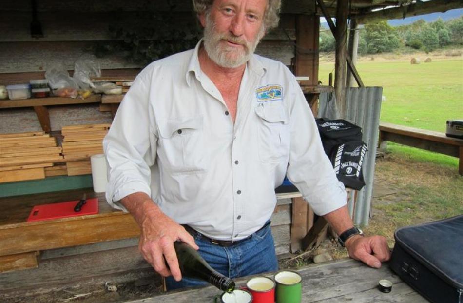Craig Williams doles out camp rations.