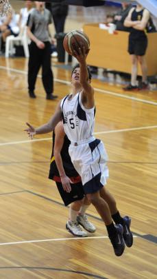 Warakau Mareroa-Gates, of Mercury Bay Area School, takes a mid-air shot at goal for the Central...