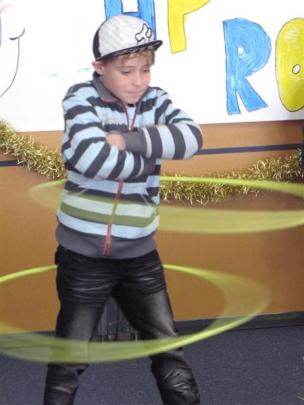 Rogan Perciville (8), of Queenstown, shows off his Hula Hoop skills during the Holiday Programme...