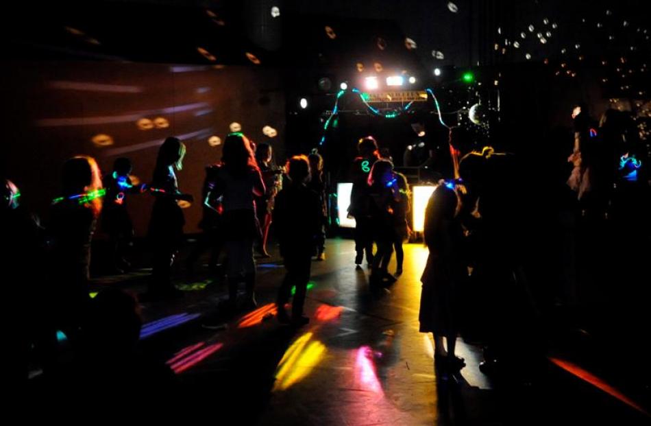 Hundreds of children aged between 5 and 10 dance at the disco.