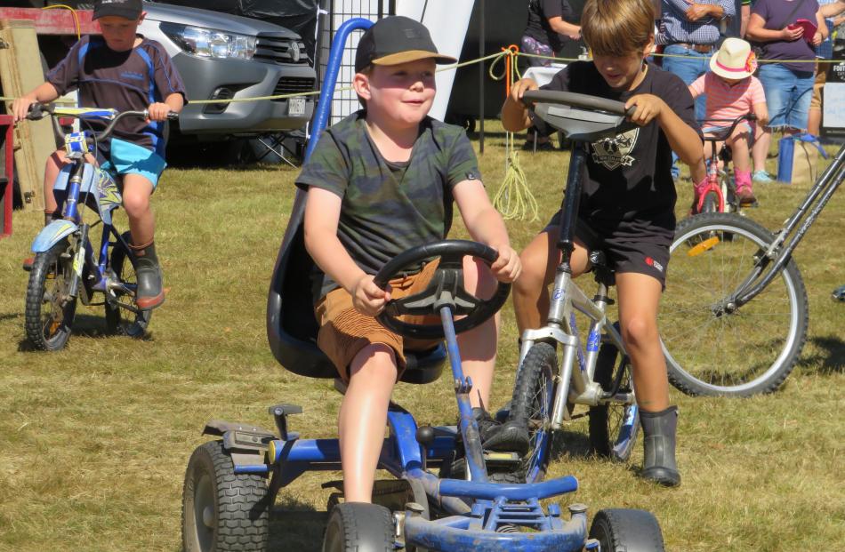 Jamieson Randell (7, of Timaru) enjoys the wobbly bikes at the Mayfield Show. Jamieson was at the...