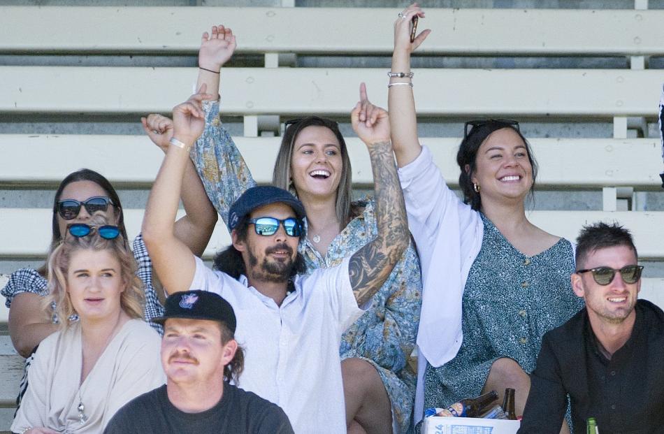 The crowd was in good spirits at the Wingatui Racecourse yesterday.
