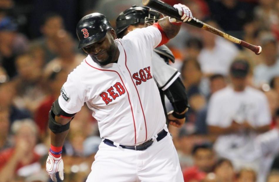 Boston Red Sox's David Ortiz reacts after striking out against the Chicago White Sox during the...