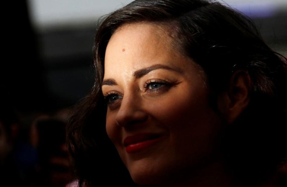 French actress Marion Cotillard arrives at the European premiere of 'The Dark Knight Rises' in...