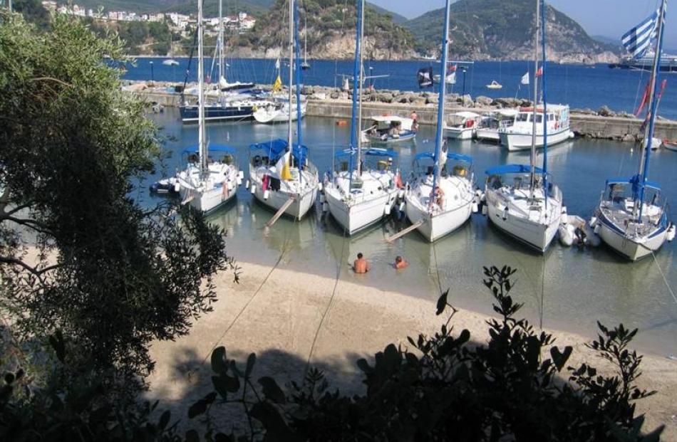 Flotilla yachts berthed on the beach at Parga, on the Greek mainland. Photo by Colin Christison.