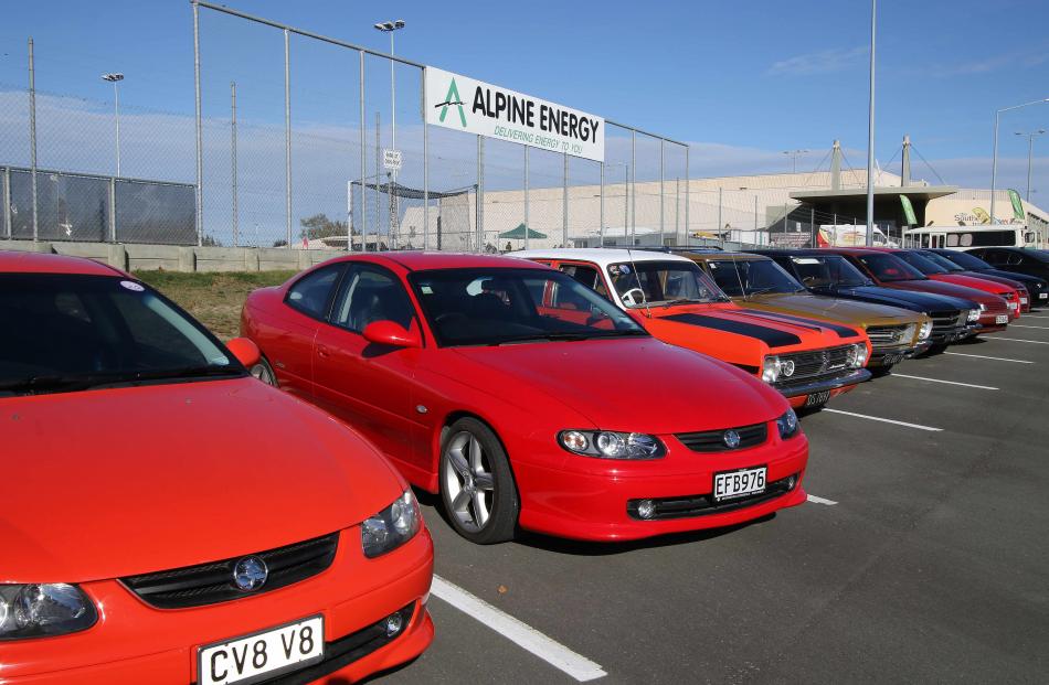  Some of the hundreds of Holdens in the public car park at the Southern Trusts Event Centre,...