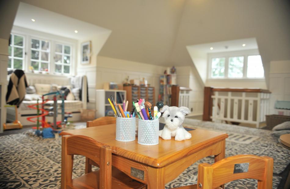 When previous owners had the house, the attic playroom was a billiards room with dark woodwork. 