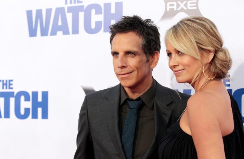 Cast member Ben Stiller and his wife Christine Taylor pose at the premiere of 'The Watch' at the...