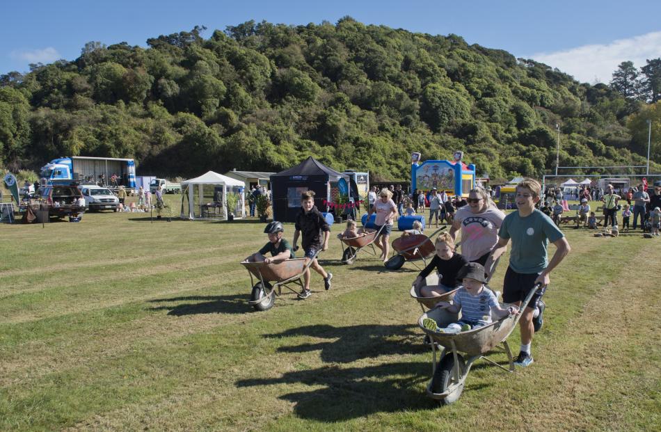 Wheelbarrow racing was popular with families.

