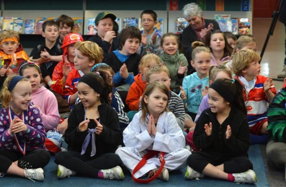 (Front row, from left) Taya Kain, Manuela Araujo, Tameka Hamilton and Eduarda Araujo (all 7)....