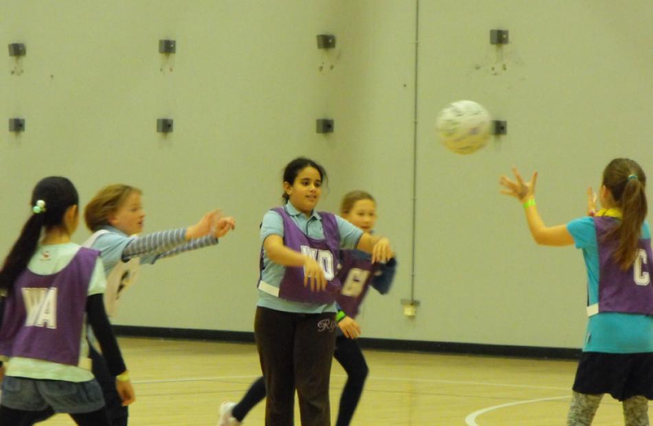 Queenstown Primary School's Francis Carmo (11) shows the skill of a future Silver Fern.