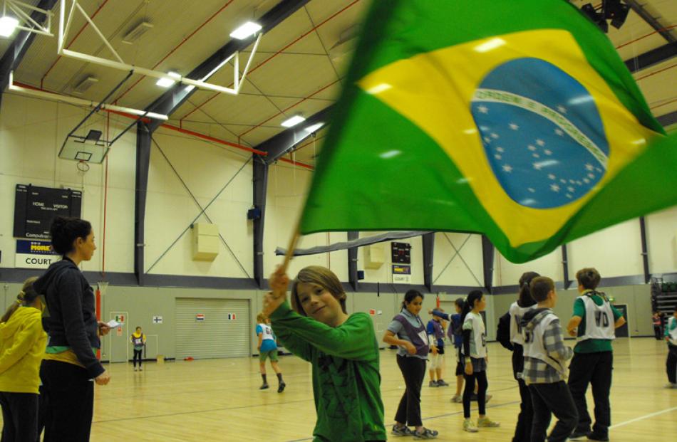 Queenstown Primary School's Jasper Bloomfield was the flag bearer for Brazil.