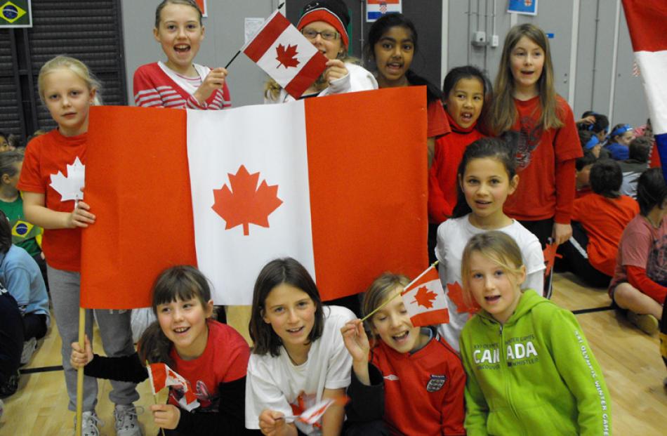 Queenstown Primary School year 5 & 6 pupils supporting Canada at the Wakatipu Kids Olympic Games.