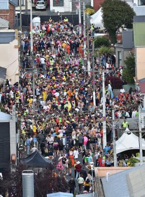Party-goers pack Hyde St for the annual event on Saturday.