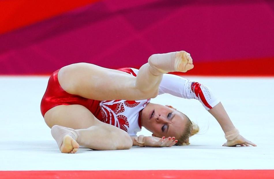 Russia's Kseniia Afanaseva falls during her floor exercise during the women's gymnastics team final.