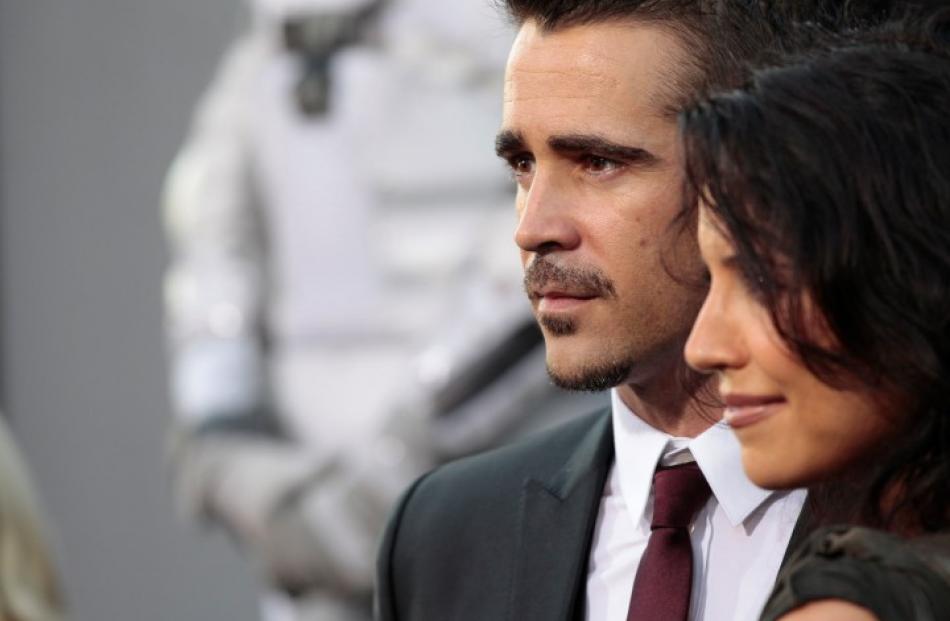 Actor Colin Farrell and his sister Claudine poses at the premiere of 'Total Recall' at the...