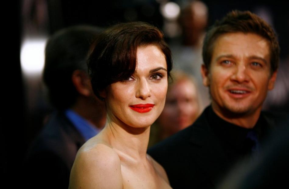 Cast members Rachel Weisz and Jeremy Renner attend the premiere of the film 'The Bourne Legacy'...