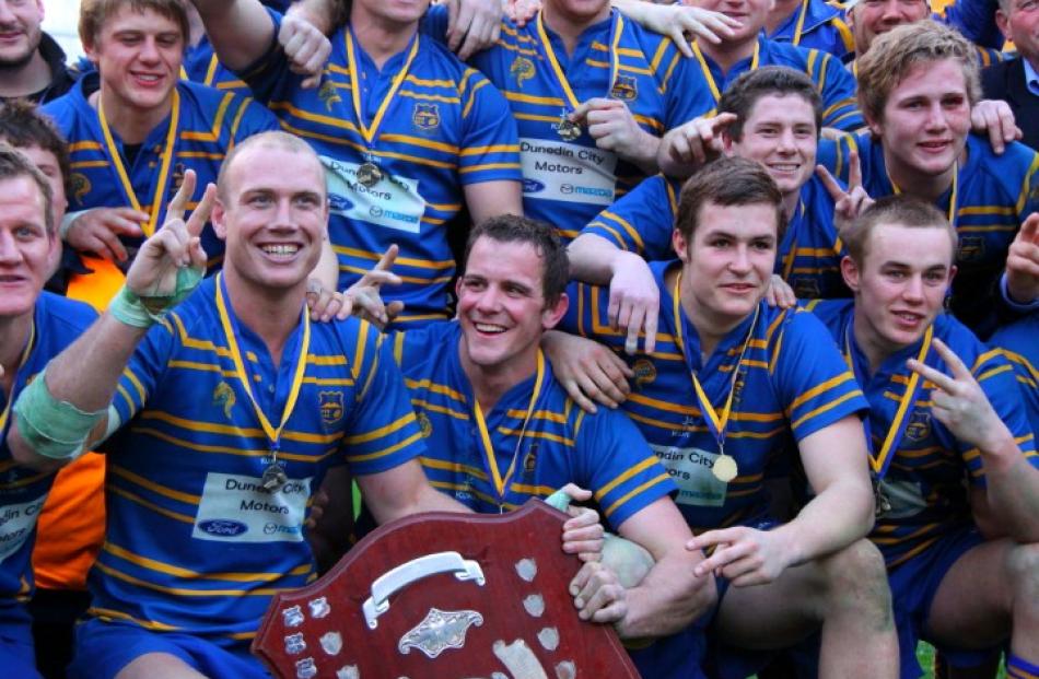 Jubilant Taieri players celebrate their win.
