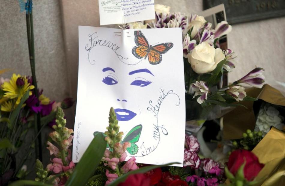 Flowers and notes left by fans on Marilyn Monroe's crypt in Pierce Brothers Westwood Village...