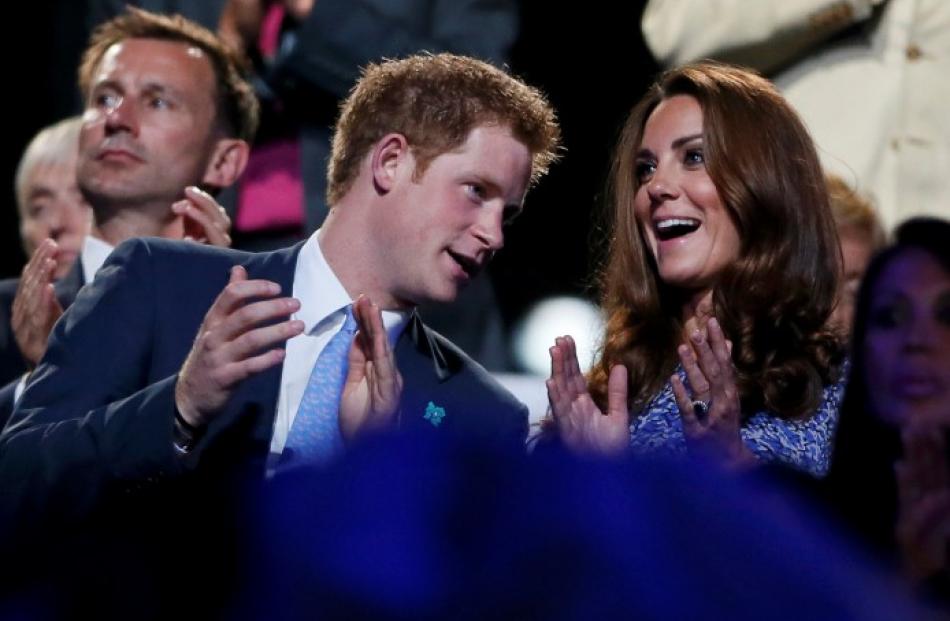 Britain's Prince Harry and Catherine, Duchess of Cambridge enjoy the evening. REUTERS/Stefan Wermuth