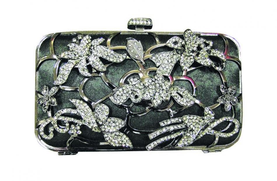 Olga Berg clutches at Arthur Barnett.