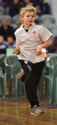 Fairfield School year 5 pupil Bradley McPate (10) sprints with his team's answer.