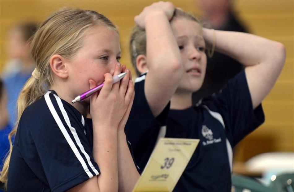 St Peter Chanel School year 5 pupils Danielle Mapley (10) and Kyra McEntyre (9) react to an...