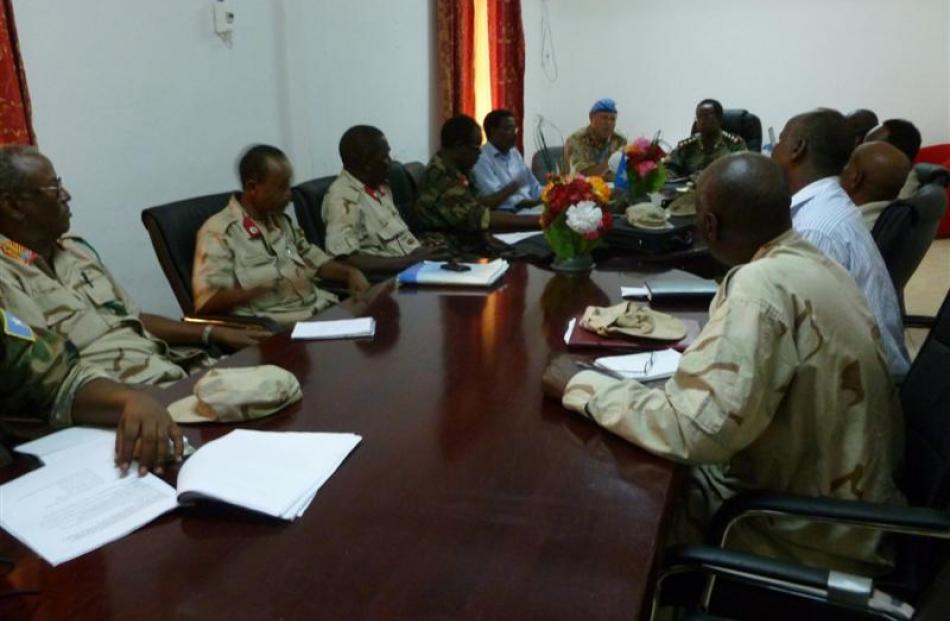 CCC in action. On my right is CDF Gen Dini, then Admiral Farrah, next to him is Brig Ali, then...