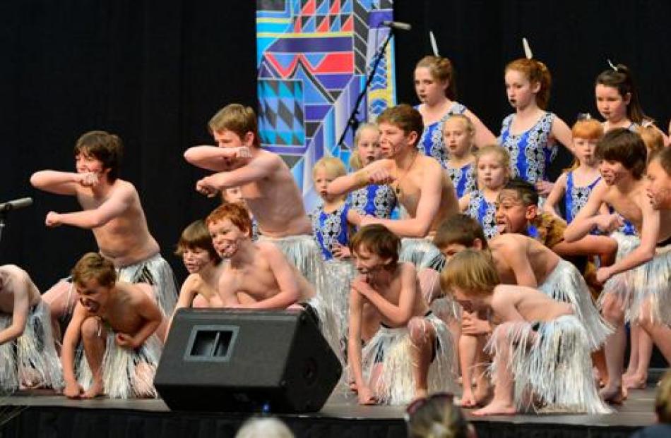 Members of St Mary's School group Te Roopu O Hato Meri showcase their moko.
