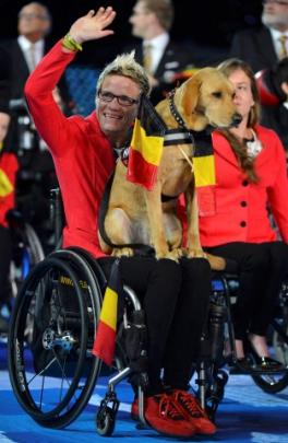 A Belgian athlete brings a friend. REUTERS/Toby Melville