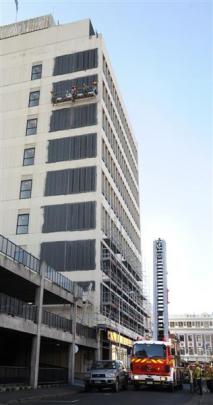A Dunedin fireman rescues two painters trapped on a scaffold 27m up the side of Radio House in...