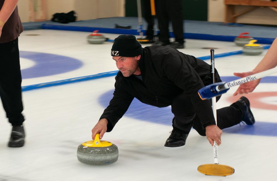 Former New Zealand Olympic curler Sean Becker shows his skill yesterday. 
