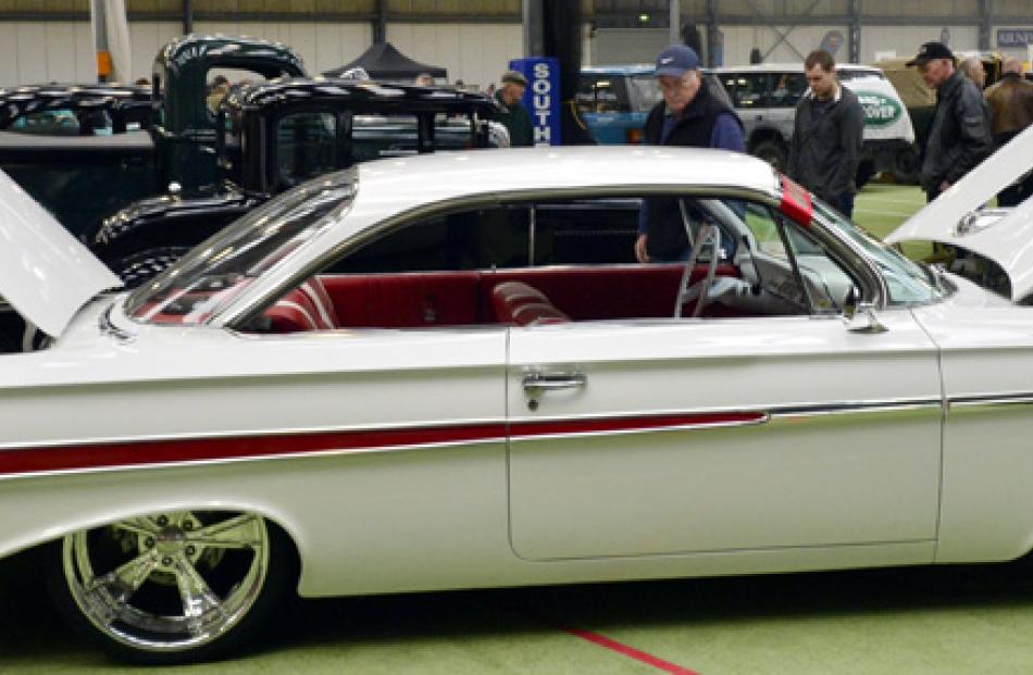 A 1961 Chevy SS Impala was a popular stop for fans of classic American automobiles.