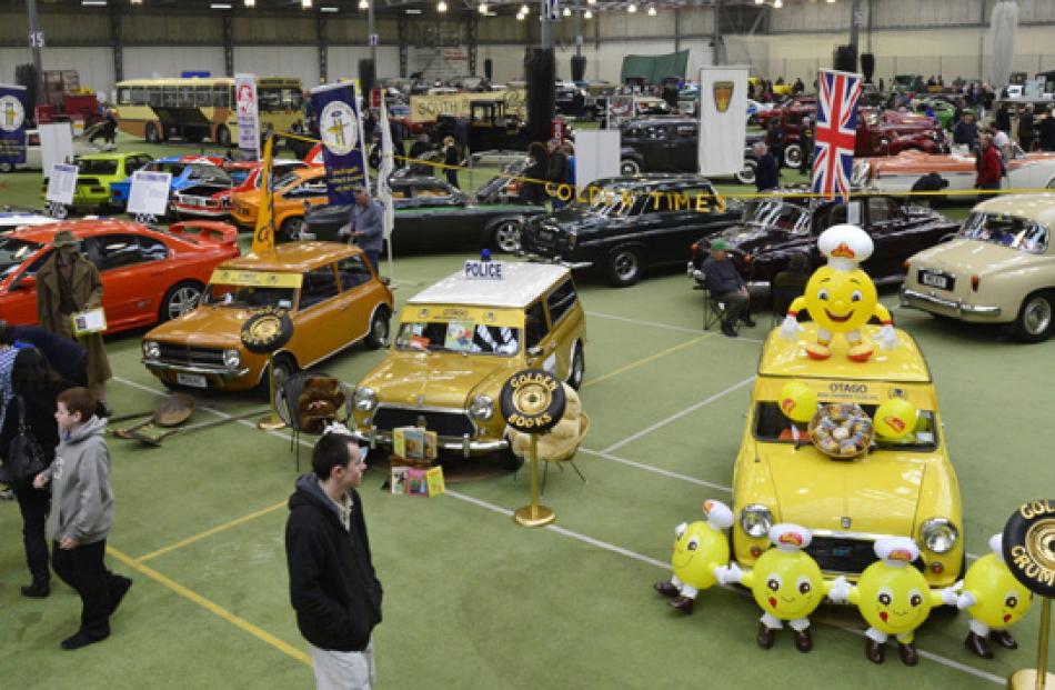 The British vehicles in this view range from a Mini to a restored Leyland bus.