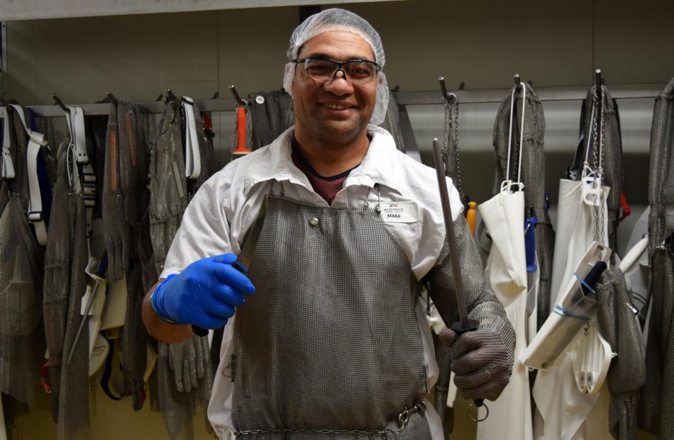 Alliance group Pukeuri plant lamb boning supervisor Maka Kautai models new chain mail armour.