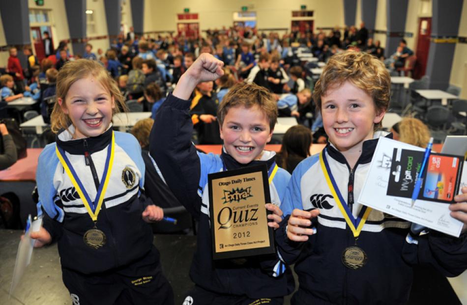 The winning George Street Normal School 1 team, (from left)  Isabelle Coe (10), Will Bryant (11)...