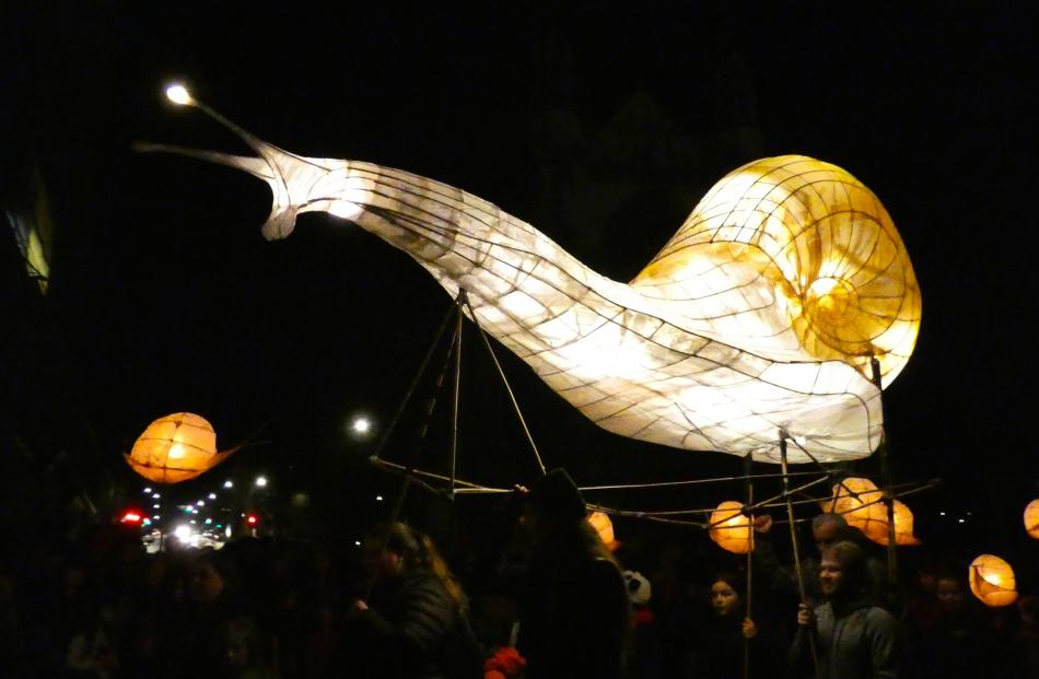 A floating lantern snail dances around the Octagon on Saturday night.