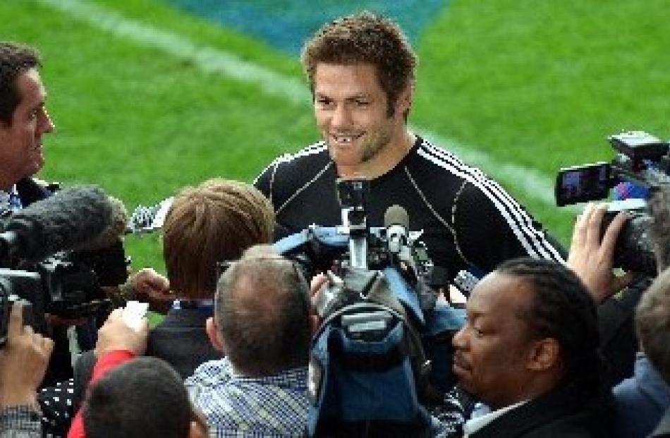 Captain Richie McCaw speaks to the media. Photos by Peter McIntosh and Craig Baxter
